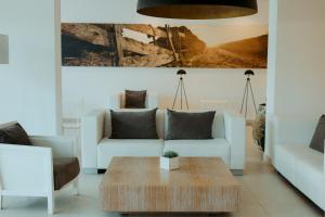 Posezení v ubytování Hotel Cala Saona & Spa