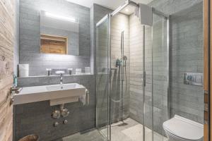 Ένα μπάνιο στο Hotel Sarain Active Mountain Resort