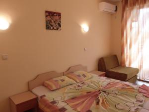 A bed or beds in a room at Hotel Sirena