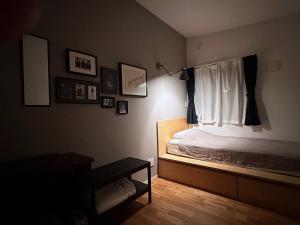 Postel nebo postele na pokoji v ubytování MARBLE B&B