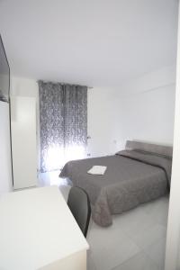 Posteľ alebo postele v izbe v ubytovaní Il Giglio