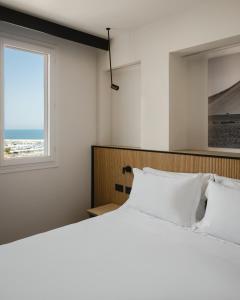 Кровать или кровати в номере View Place & Spa
