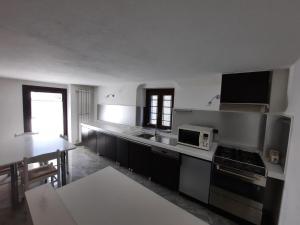 Kuchyň nebo kuchyňský kout v ubytování b&b Al Castel + 37 fotografií