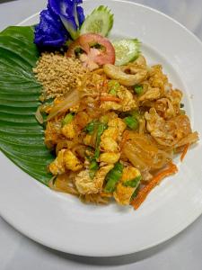 a plate of food on a white plate at Khao Sok Green Mountain View in Khao Sok National Park
