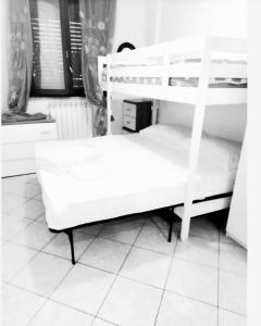 a black and white photo of a bunk bed at Alba Sweet in Alba Adriatica