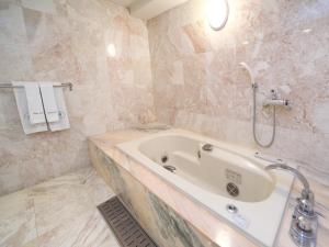 Koupelna v ubytování Suikouen Hotel + 27 fotografií