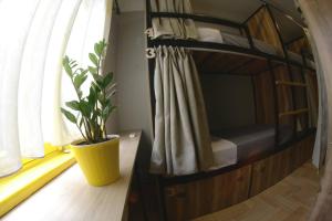 Voodi või voodid majutusasutuse Hostel Nomad toas