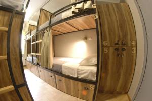 Voodi või voodid majutusasutuse Hostel Nomad toas