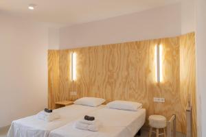 A bed or beds in a room at Primera Línea de Playa - MÁLAGA