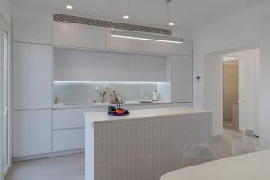 A kitchen or kitchenette at Primera Línea de Playa - MÁLAGA