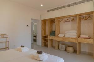 A bed or beds in a room at Primera Línea de Playa - MÁLAGA