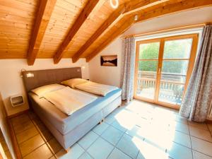 Postel nebo postele na pokoji v ubytování Urlaubshof Bechteler