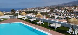 arial view of a hotel with a swimming pool at Apartment Island Paradise in Adeje