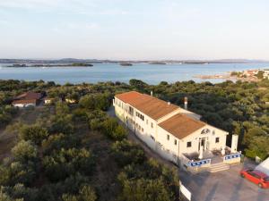 an aerial view of a house with a view of the water at Camping Torkul in Kraj