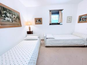Postel nebo postele na pokoji v ubytování Torretta sleeps 5 with pool and exclusive gardens plus private verandah