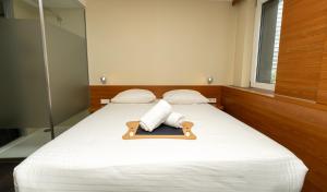 Postel nebo postele na pokoji v ubytování Hotel Düsseldorfer Hof