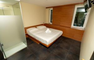 Postel nebo postele na pokoji v ubytování Hotel Düsseldorfer Hof