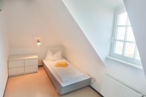 Postel nebo postele na pokoji v ubytování Hofgärtnerhaus