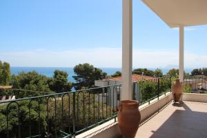 a balcony with a view of the ocean at Appartanvilla Magellano in Mondello
