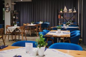 Reštaurácia alebo iné gastronomické zariadenie v ubytovaní Golden Tulip Gdańsk Residence