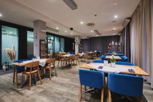 Reštaurácia alebo iné gastronomické zariadenie v ubytovaní Golden Tulip Gdańsk Residence