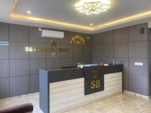a reception desk in a dental office at SB Golden Cherry in Yelahanka