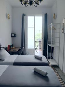 Cama ou camas em um quarto em Fabrizzio's Petit
