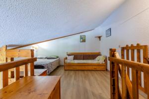 Letto o letti in una camera di Aravis