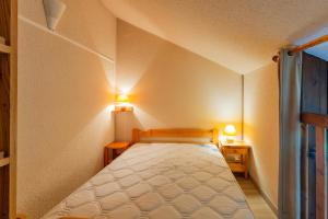 Letto o letti in una camera di Aravis