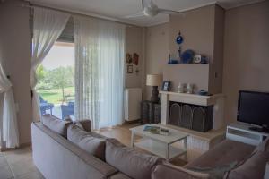 Posezení v ubytování Sunset Villa 1