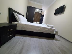 A bed or beds in a room at Hotel N