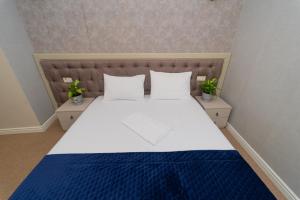 Letto o letti in una camera di Maner hotel