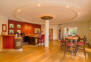 Kuchyň nebo kuchyňský kout v ubytování Main-Vinotel Weingut Helmstetter