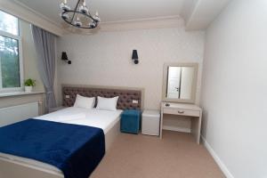 Letto o letti in una camera di Maner hotel