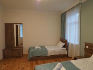 Posteľ alebo postele v izbe v ubytovaní Polaris Kazbegi
