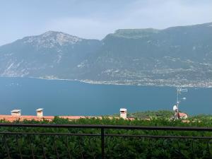 a view of a body of water with a mountain at Casa Eulberg Marcania Balcone vista lago in Tremosine Sul Garda