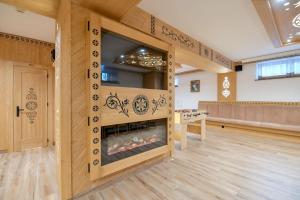 Kuchyňa alebo kuchynka v ubytovaní Pod Tatrami 1 - świetna lokalizacja - sauna fińska oraz infrared i grota solna - jedno wejście gratis
