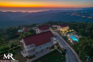 an aerial view of a house with a sunset at Residence Mancini - Cilento Home & Sunset in Rocca Cilento