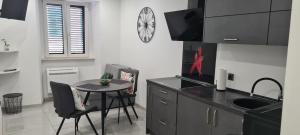 Kuchyňa alebo kuchynka v ubytovaní Apartman Julija 1