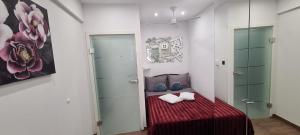 Posteľ alebo postele v izbe v ubytovaní Apartman Julija 1