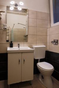 A bathroom at East Station Private Rooms Még 8 kép