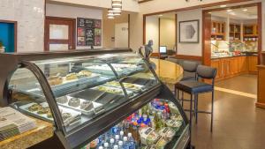 a bakery with a display case with food and drinks at Hyatt Place Austin Arboretum Domain Area in Austin