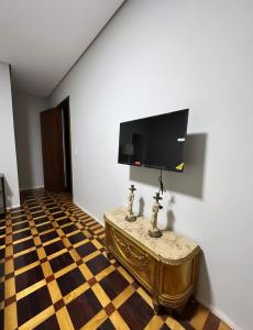 TV a/nebo společenská místnost v ubytování Hotel Dom Marechal neoclássico