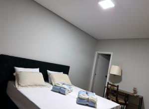 Postel nebo postele na pokoji v ubytování Hotel Dom Marechal neoclássico