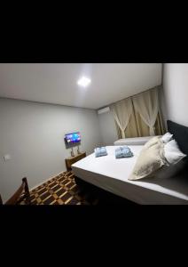 Postel nebo postele na pokoji v ubytování Hotel Dom Marechal neoclássico