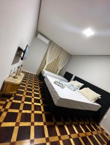 Postel nebo postele na pokoji v ubytování Hotel Dom Marechal neoclássico