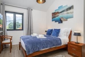 Llit o llits en una habitació de Basalt Dwelling II by Madeira Sun Travel