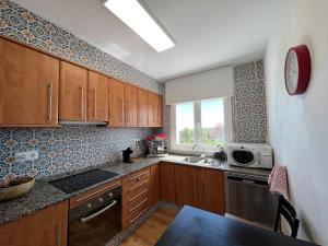 Kjøkken eller kjøkkenkrok på Monserrat vista unica