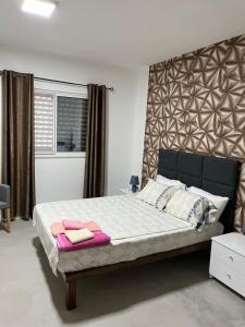 Katil atau katil-katil dalam bilik di Apartamentos Santiago - Tarrafal