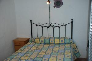 Postel nebo postele na pokoji v ubytování Bungalow Almadrava 11 Con Vistas al Mar